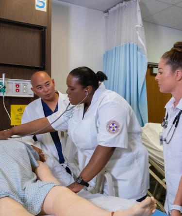 Nursing Students Checking Heartbeat