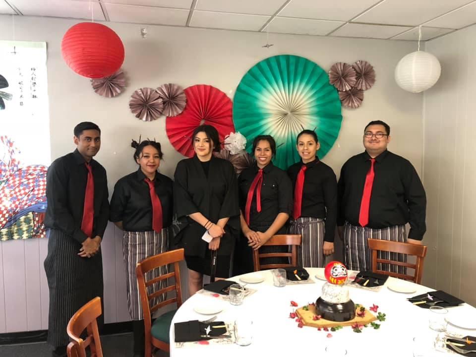 Students Celebrating an Oriental Food Event