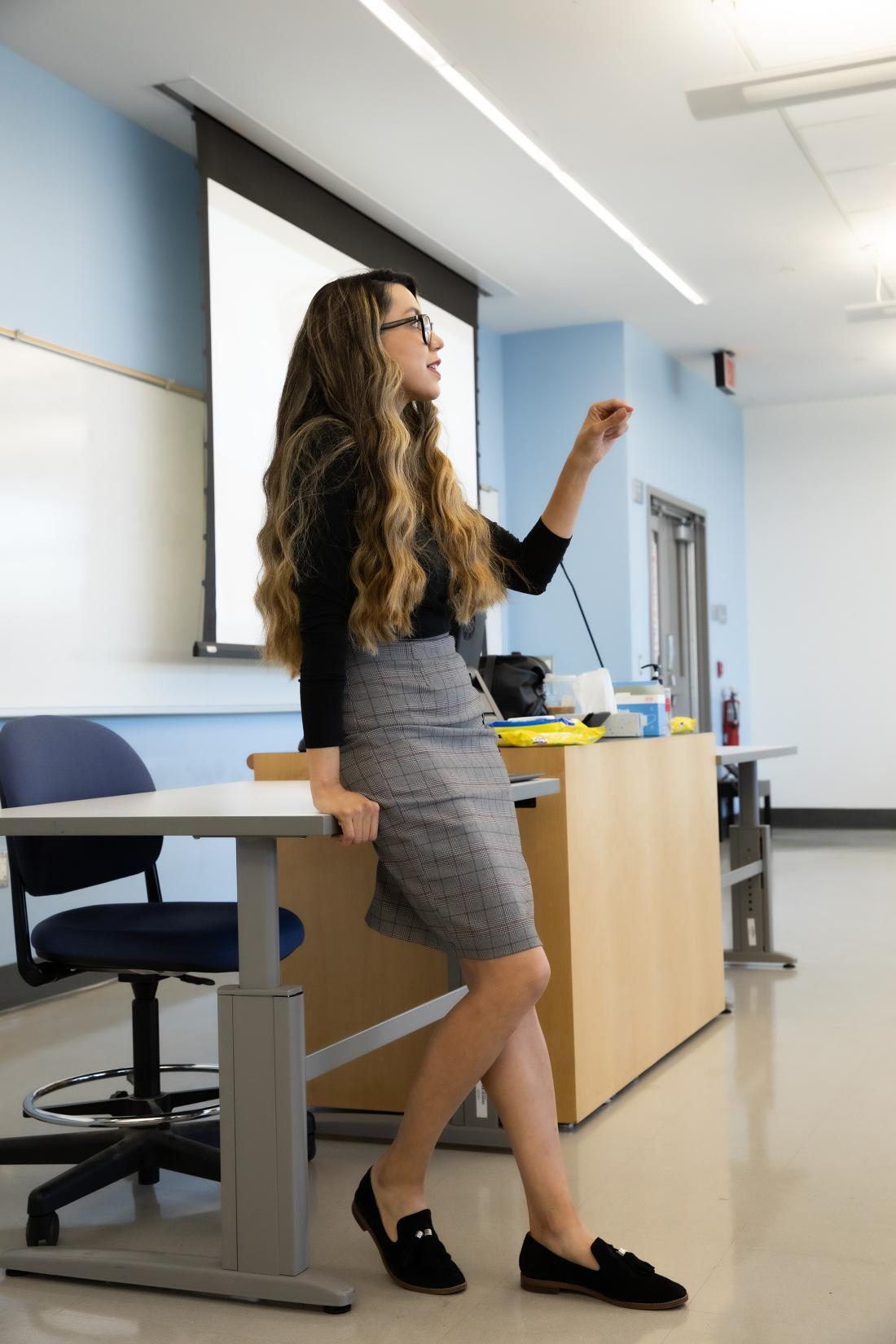 Teacher Explaining in Classroom