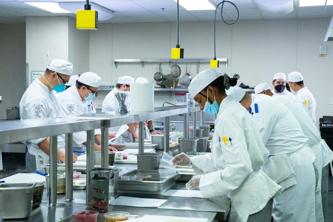 Group of Chefs Cooking in Class