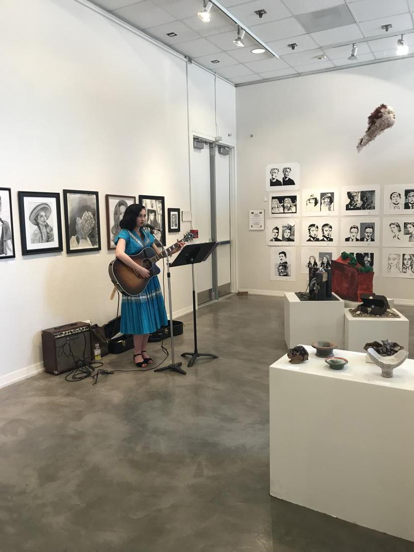 Woman playing guitar 3